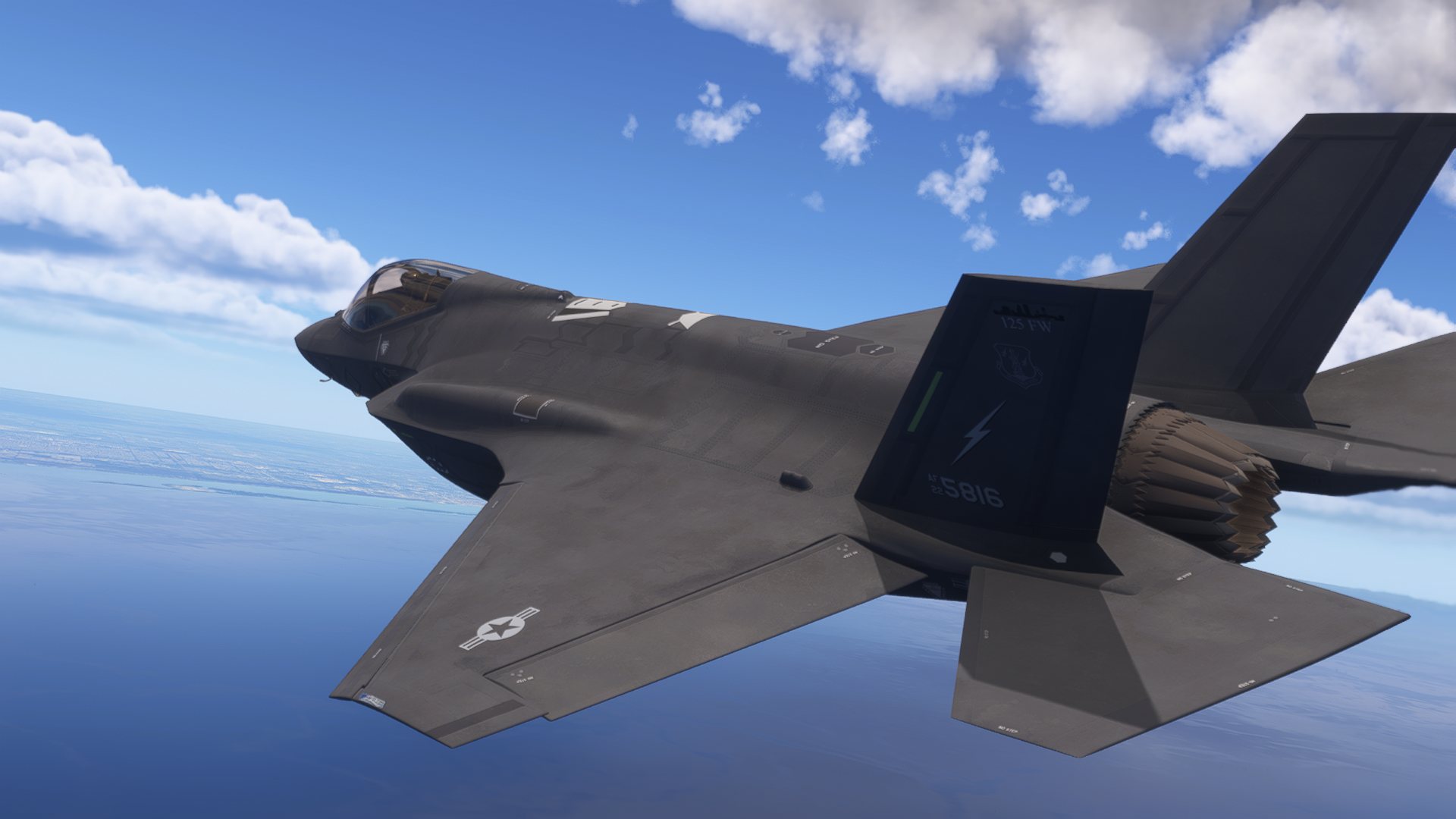 Virtual F-35 aircraft maneuvering above the coastline