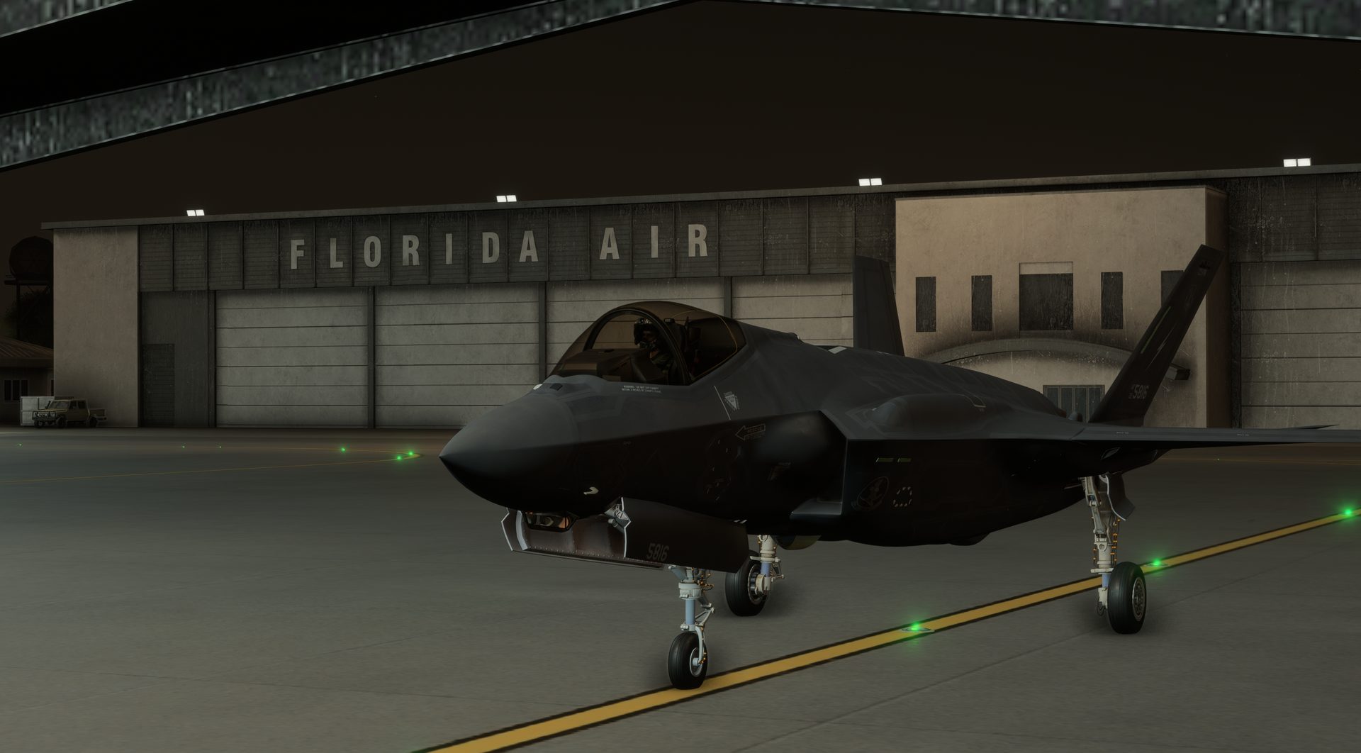Virtual F-35 taxiing at night outside the Florida Air hangar