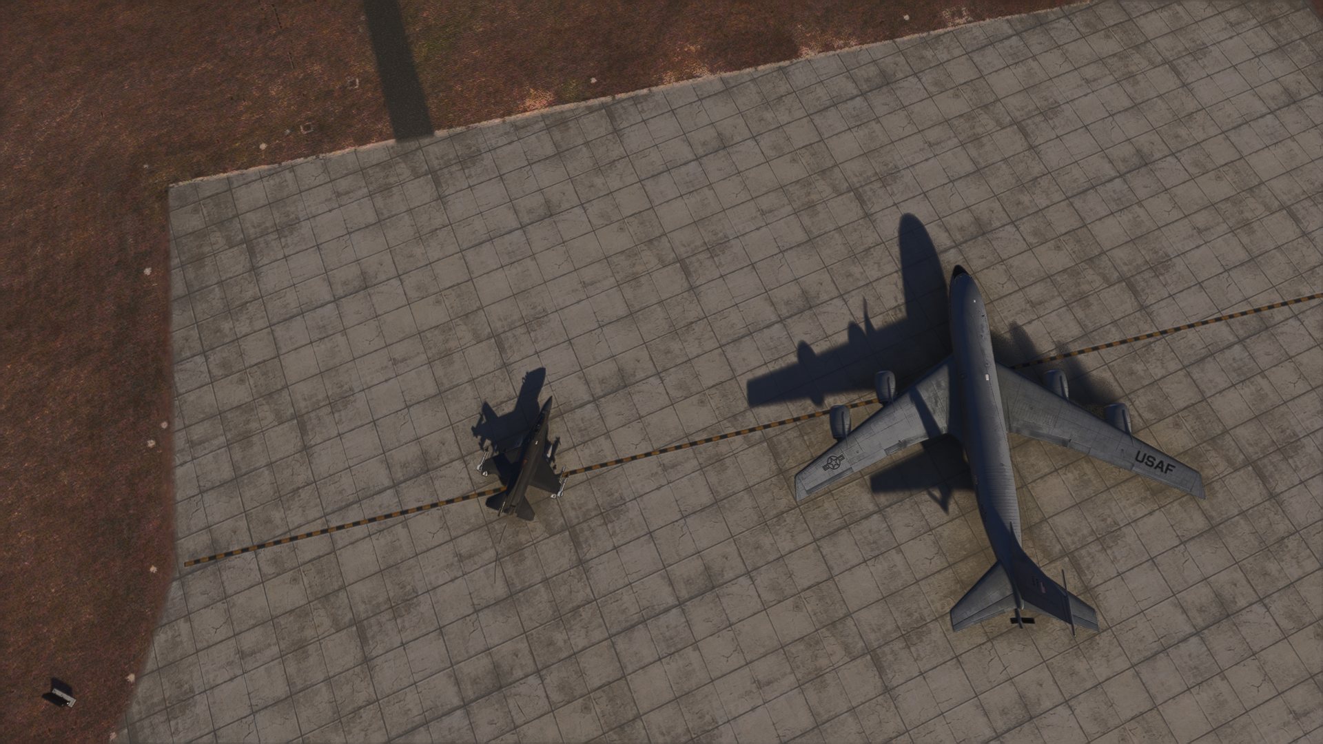 Overhead view of virtual fighter and tanker aircraft on a ramp